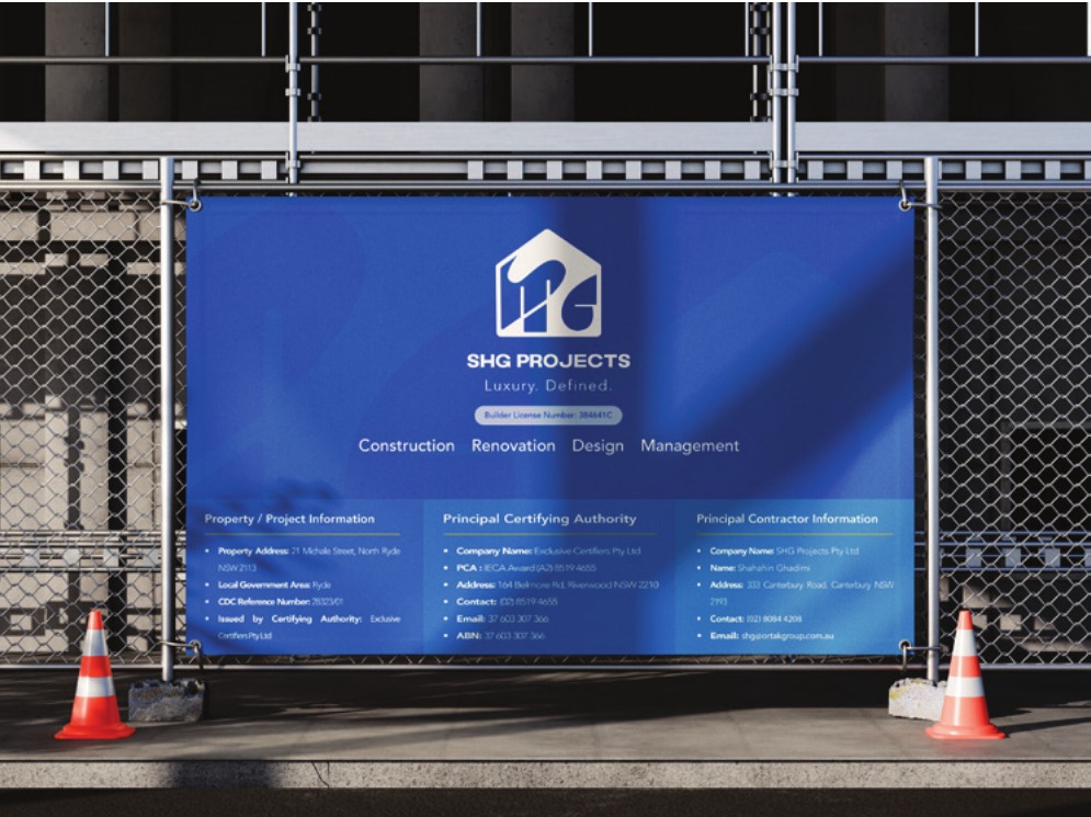 Branded blue construction fence banner with the SHG Projects logo, company services and statutory site authority details
